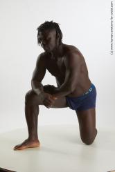 Underwear Man Black Kneeling poses - ALL Muscular Medium Kneeling poses - on one knee Black Standard Photoshoot Academic